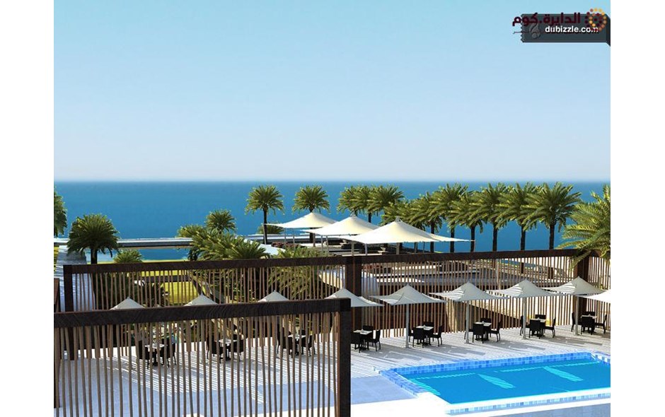 شالية للبيع بمنتجع الساحل الشمالى على حمام السباحة